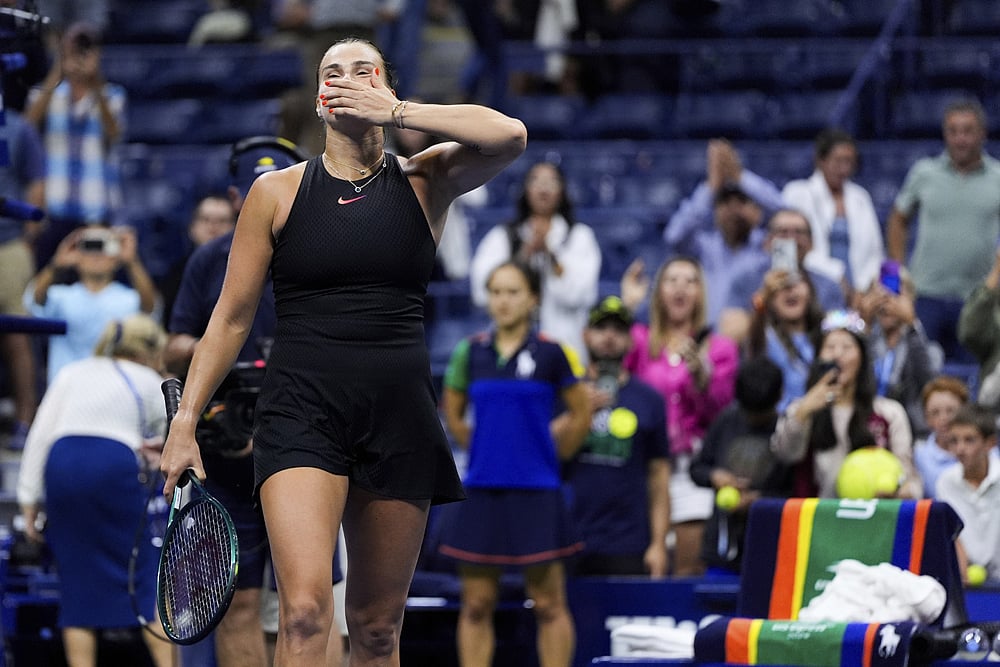 | Photo: AP/Julia Nikhinson : US Open 2024: Aryna Sabalenka, of Belarus, reacts to winning a match against Erika Andreeva, of Russia